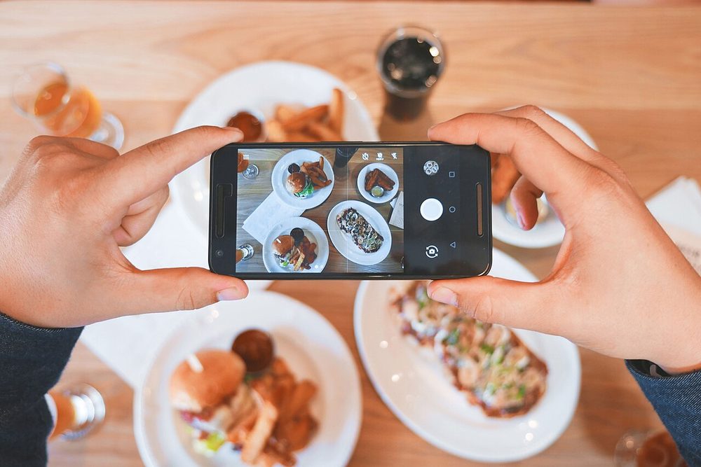 Smartphone taking a photo of food